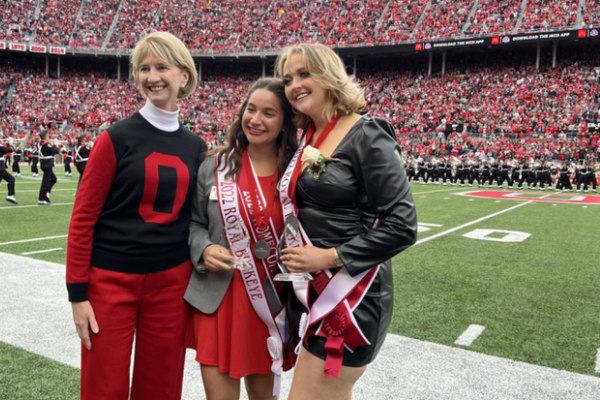 WGSS minor and Homecoming Royalty Kelsey Lowman alongside fellow Homecoming Royalty Shayna Kling and Ohio State President Kristina Johnson